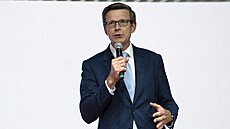 Místopedseda hnutí ANO Karel Havlíek a ministr dopravy za ODS Martin Kupka.