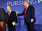 Ruský prezident Vladimir Putin a americký prezident Donald Trump na vojenské...