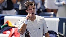 Jakub Men�ík se na US Open raduje z postupu do 2. kola.
