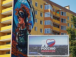 Nást�nná malba v okupovaném Mariupolu (12. �ervna 2024)