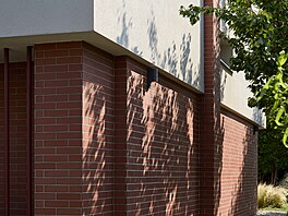 Celková rekonstrukce vetn fasády se dotkla dispozice, materiál i objemu...