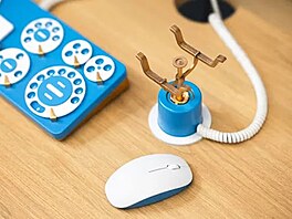 Nechybí ani stylový stojánek na my.