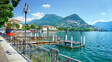 Lake Lugano promenade with panoramic views of the city and the Alps, Lugano,...