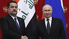 Ruský prezident Vladimir Putin s iráckým premiérem . Muhammadem ijou...