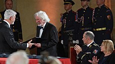 Prezident republiky udlil medaili Za zásluhy panu profesoru magistru Petru...