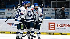 Du�an �ovinec, Martin Jandus a Niko Ojamäki z Kladna slaví gól proti Olomouci.