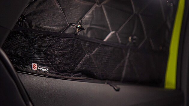 �koda Enyaq Coup� RS ve spac� �prav� Obytnaq, soukrom� zaji��uj� termoclony vyroben� na m�ru.