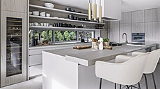 Kuchy� je vybavená skv�lými spot�ebi�i Miele, dv�ma chladni�kami i troubami, a...