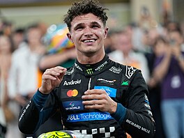 Lando Norris slaví zisk mistrovského titulu.