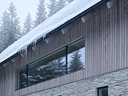 P�esto�e návrh navenek respektuje tradi�ní výraz horských stavení s kamenným...