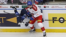 JIí ernoch narazil na mantinel Hannes Björninena.