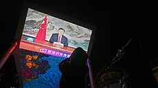 �í�ané sledují novoro�ní projev Si �in-pchinga. (31. prosince 2025)