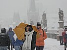 Do �esk� metropole dorazil sn�h. V Praze sn�� u� od �asn�ho r�na. Na sn�mku...