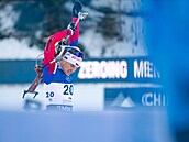 Michal Kr�má� na st�elnici p�i sprintu v Ruhpoldingu