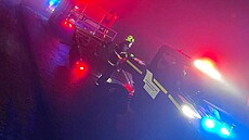 Pátrání po ztracených snowboardistech v oblasti Klínovce v Kru�ných horách (17....