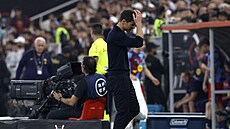 Kou� Realu Madrid Xabi Alonso b�hem finále �pan�lského superpoháru s Barcelonou.