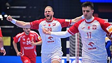 Polský házenká� Maciej Gebala oslavuje.