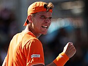 Jakub Men�ík slaví postup do druhého kola Australian Open.
