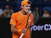 Jakub Men�ík se hecuje ve t�etím kole Australian Open.