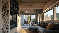 St�ny z b�leného smrku doplnily masivní d�ev�né trámy.