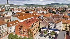 Na míst� bývalého �elezá�ství ve Vav�inecké ulici nedaleko Mírového nám�stí v...