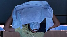 Tomá� Machá� se ochlazuje ve t�etím kole Australian Open.