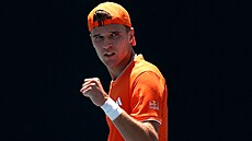 Jakub Men�ík se raduje z povedeného úderu v prvním kole Australian Open.