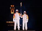 Zapálením olympijských oh�� za�aly v Itálii XXV. zimní hry. Obstarali to t�i...