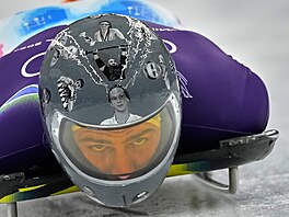 Ukrajinský skeletonista Vladyslav Heraskevy� na olympijské dráze v Cortin�...