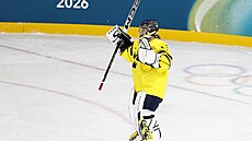 Radost �védských hokejistek b�hem zápasu proti N�mecku na olympijských hrách....