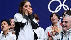 Riku Miuraová a Ryuichi Kihara z Japonska reagují na své skóre po sout�i v...