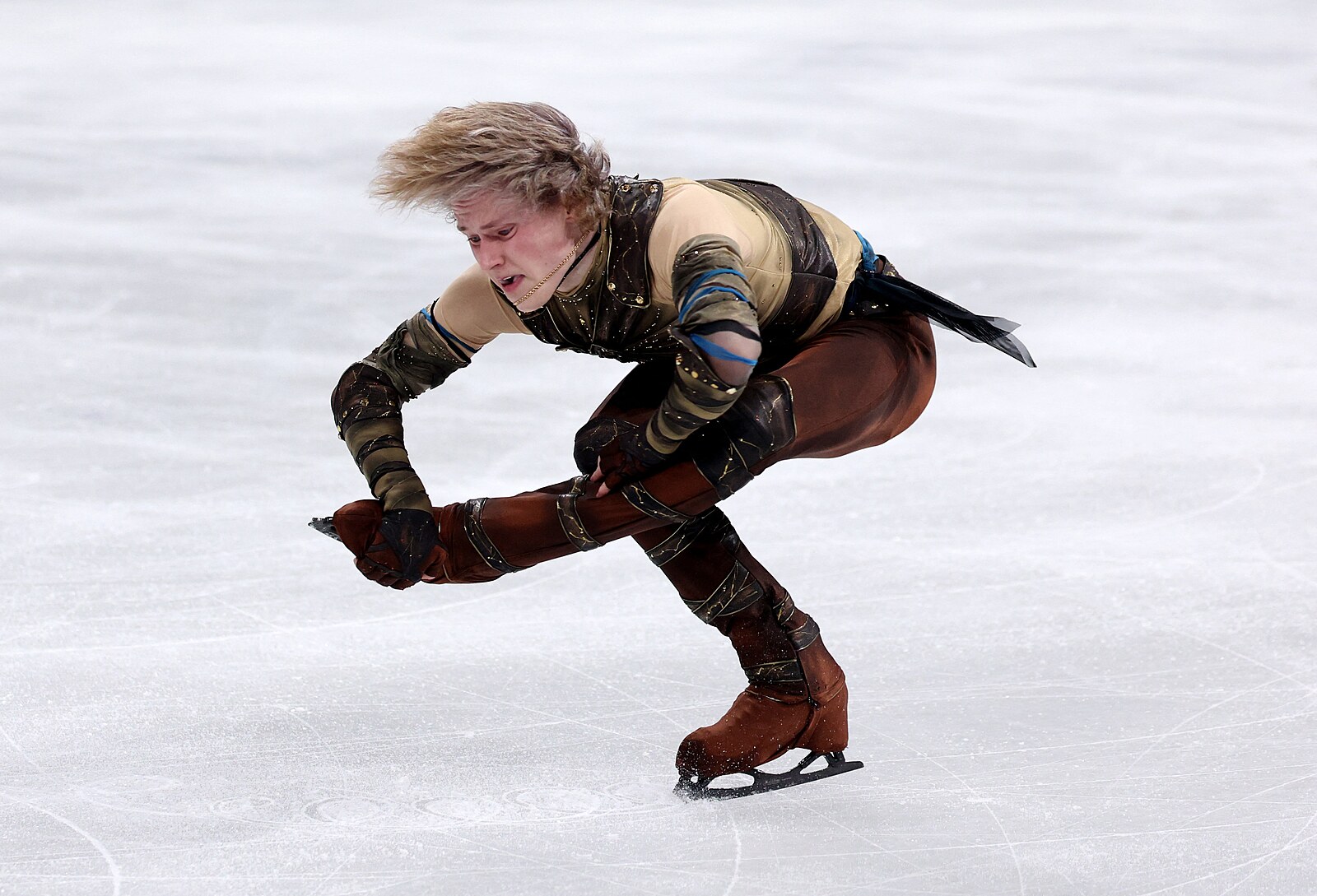 Favorit Malinin ovládl krátký program krasobruslařů. Čtverného axela si šetří