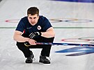 Marek �ernovský z �eské republiky sleduje zápas proti Kanad� v curlingu. (16....