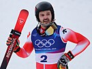 Zlatý medailista Loic Meillard ze �výcarska slaví vít�zství ve slalomu mu��....