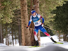 Michal Kr�má� z �eska b�hem sprintu na 10 kilometr� v biatlonu. (13. února 2026)