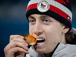 Rychlobrusla� Metod�j Jílek se zlatou medailí po vít�zství v olympijském závod�...