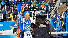 Italská biatlonistka Lisa Vittozziová t�sn� poté, co získala první individuální...