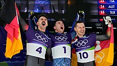 Zleva: n�mecký st�íbrný medailista Axel Jungk, britský zlatý medailista Matt...