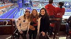 Petra Klímová, Julie Klípová a Laura Juríková (zleva) podporují z tribuny své...
