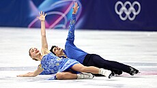 Piper Gillesová a Paul Poirier jsou krasobrusla�i reprezentující Kanadu. (11....