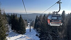 �ernohorský expres doveze turisty nahoru za pouhých sedm minut. Pod ním je hned...