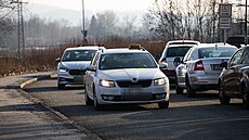 Auta taxiká�� zdobily r��ové a reflexn� zelené pruhy v barvách reflexních prvk�...