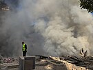 Následky izraelských leteckých útok� v Dáhíji na p�edm�stí libanonské metropole...