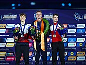 Metod�j Jílek na stupních vít�z� MS ve víceboji. Vedle n�j zlatý Sander Eitrem...