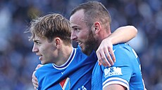 Václav Jure�ka z Baníku (vpravo) se raduje ze t�etího gólu proti Zlínu,...