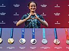 Martina Sáblíková se sbírkou svých olympijských medailí.