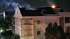 V centrální �ásti Izraele vypukl po�ár obytného domu po íránském raketovém...