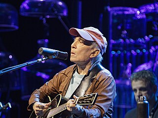 Zp�vák Paul Simon