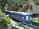 Peru Rail 3' gauge Macosa dmu No.220 approaches Aguas Calientes on a service...