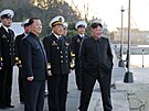 V�dce KLDR Kim �ong-un spole�n� s vysokými p�edstaviteli ministerstva obrany a...